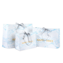 300gsm custom own logo printed gift packaging paper bags with bow tie